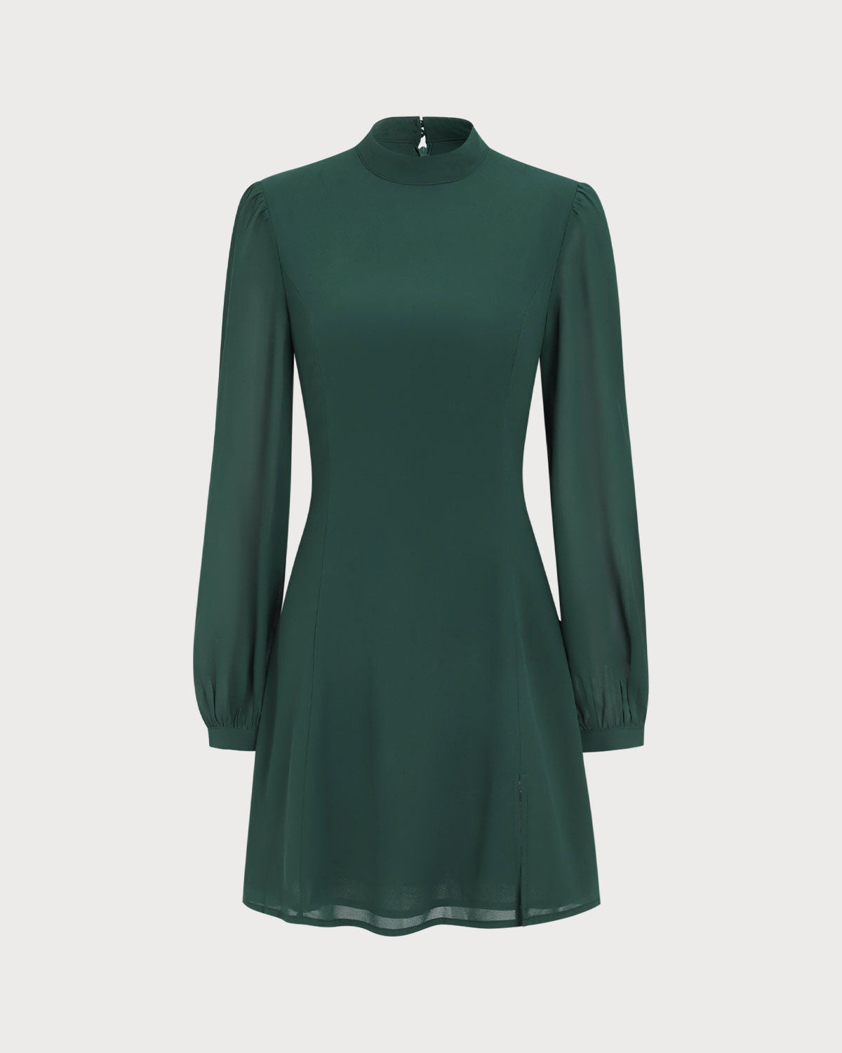Vestido corto verde de transparencias con cuello alto y abertura