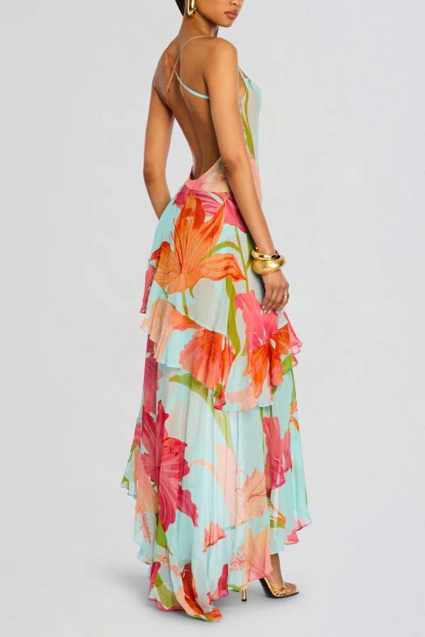 Vestido largo de flores con tirantes finos, espalda descubierta y volante asimétrico