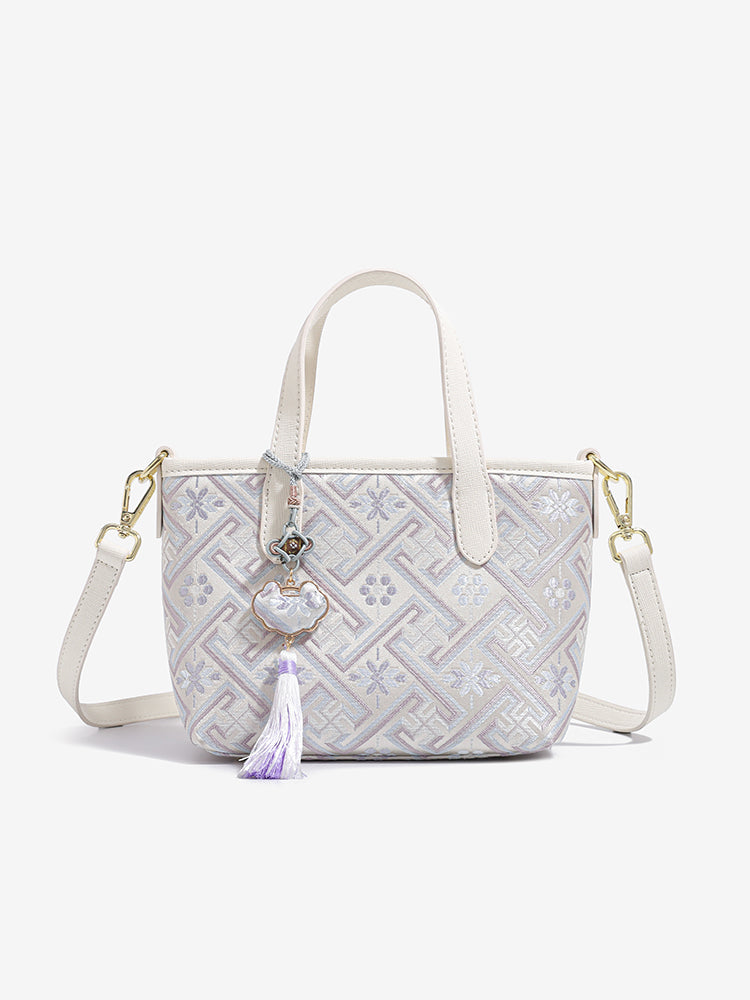 Bolso tote de piel vegana con jacquard oriental y borla