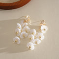 Pendientes largos de flores con borlas multicapa