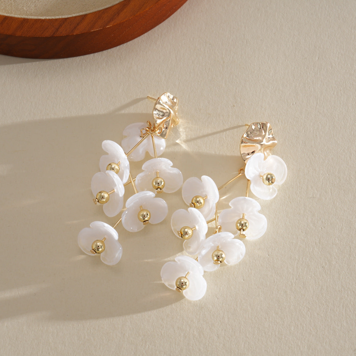 Pendientes largos de flores con borlas multicapa