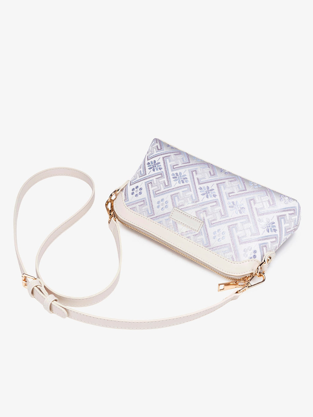 Bolso mini clutch de piel vegana con jacquard pastel