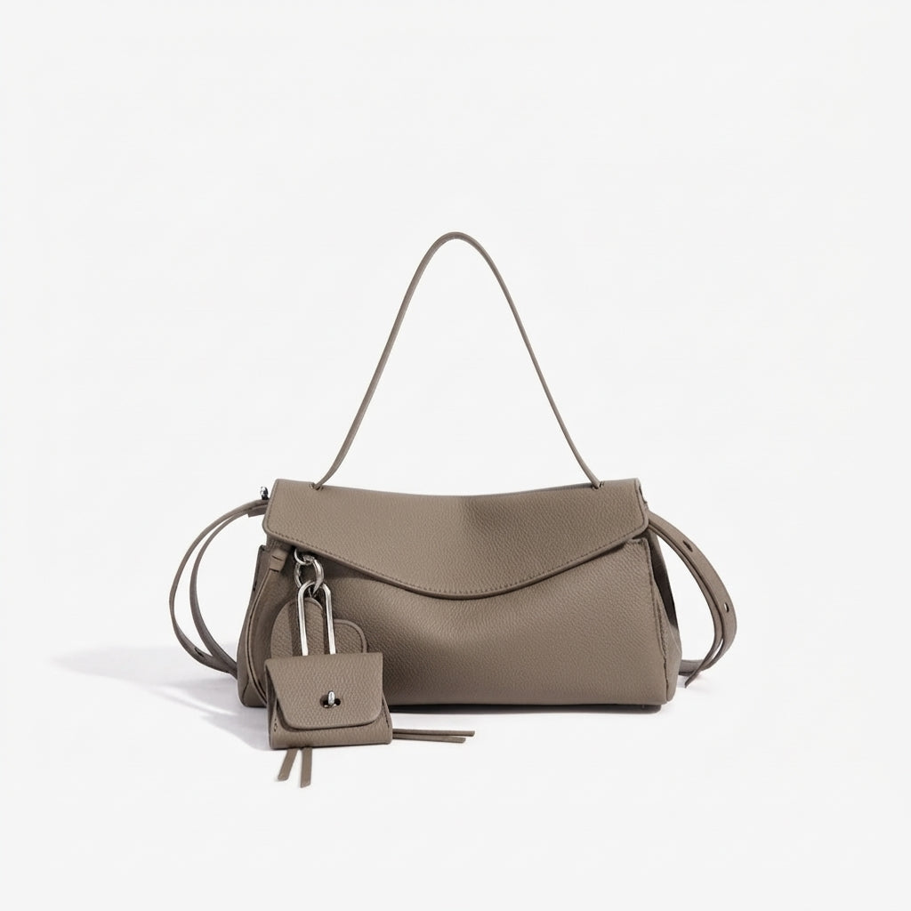 Bolso clutch de piel con solapa y monedero pequeño