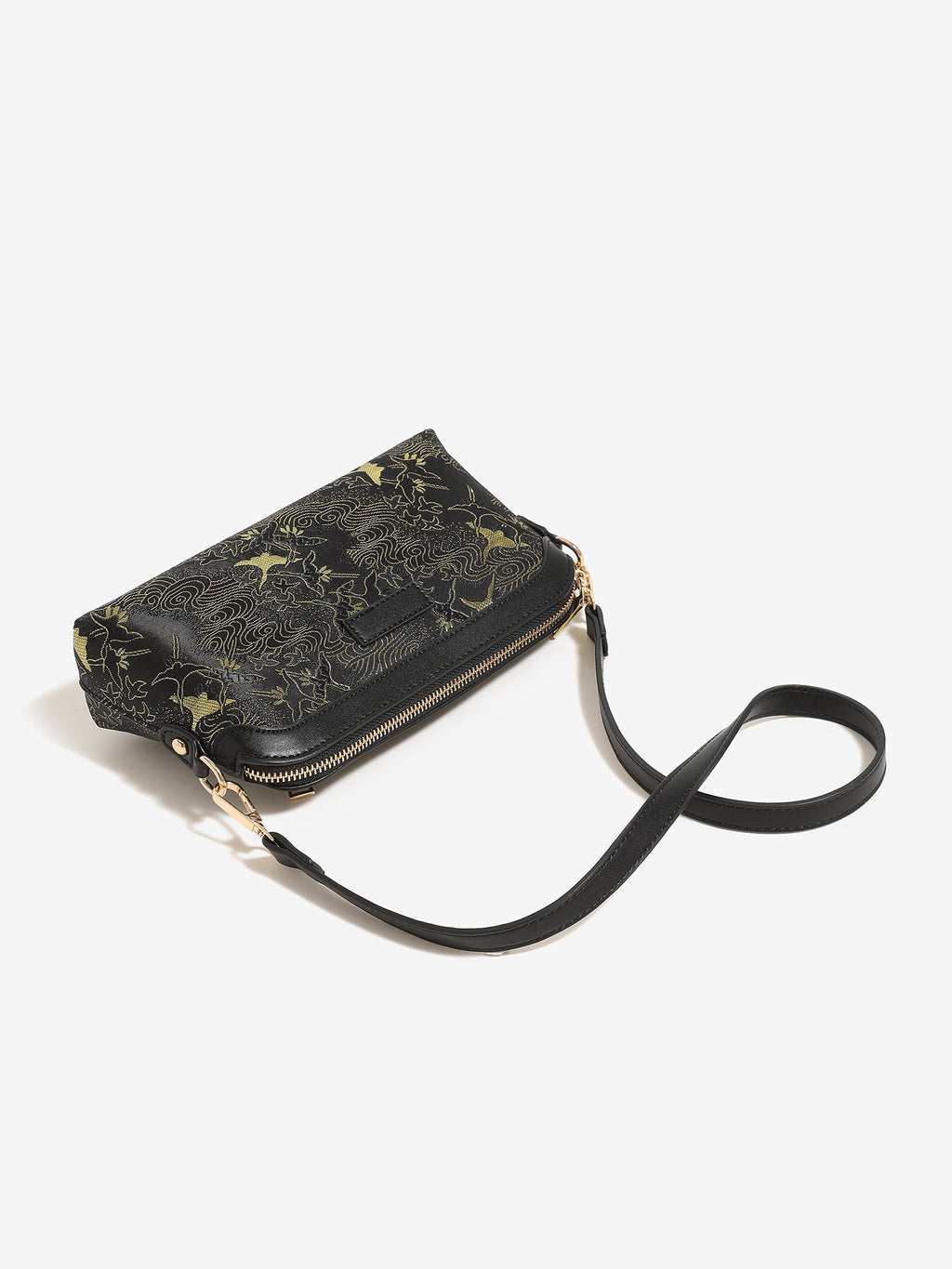 Bolso clutch de piel vegana con estampado de grullas