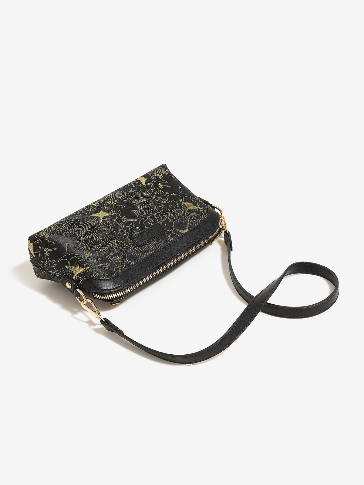 Bolso clutch de piel vegana con estampado de grullas