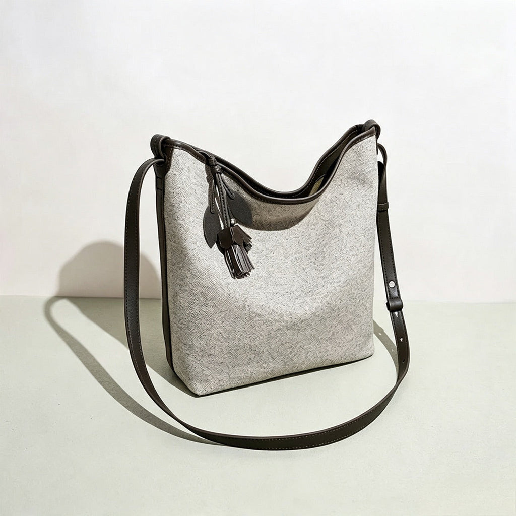 Bolso saco de lona con borla