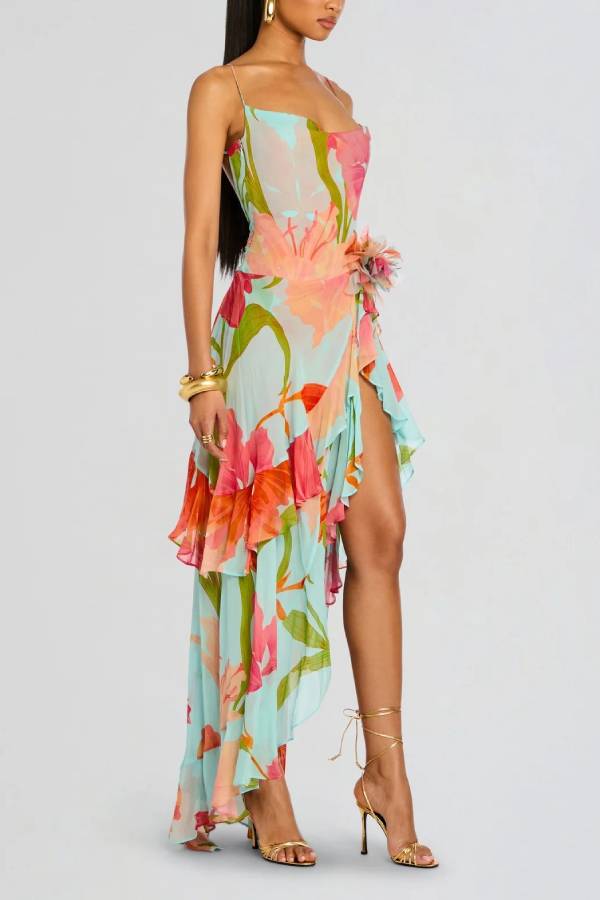 Vestido largo de flores con tirantes finos, espalda descubierta y volante asimétrico