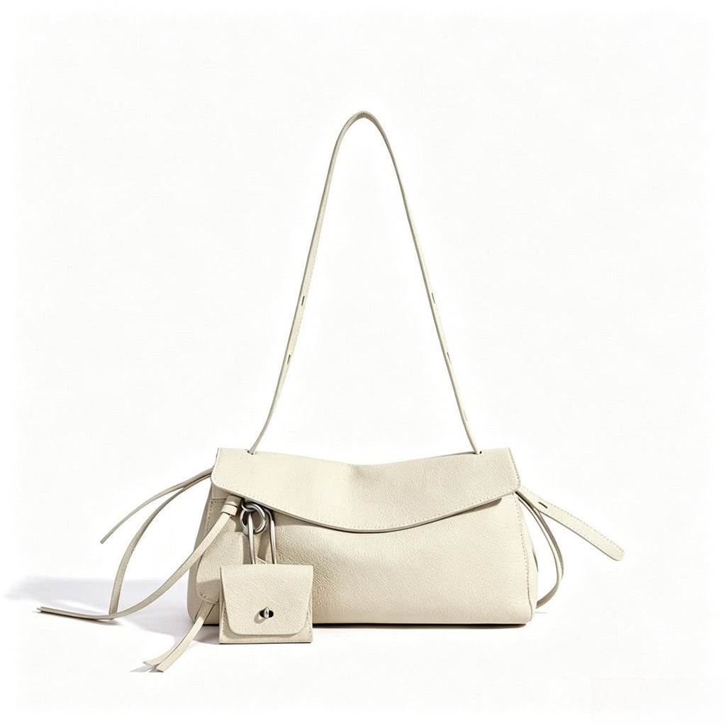 Bolso clutch de piel con solapa y monedero pequeño