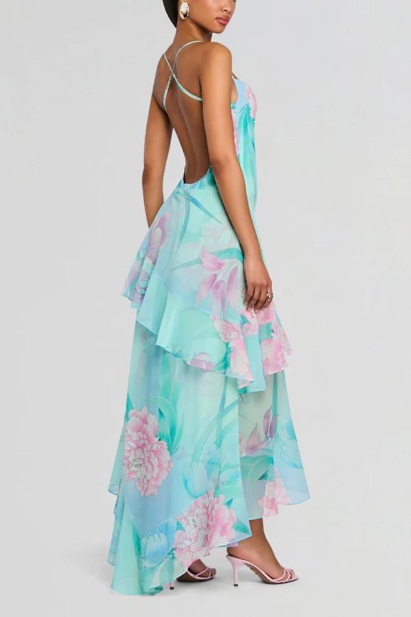 Vestido largo de flores con tirantes finos, espalda descubierta y volante asimétrico