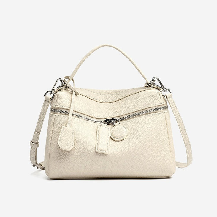 Bolso clutch cuadrado tipo almohada de piel