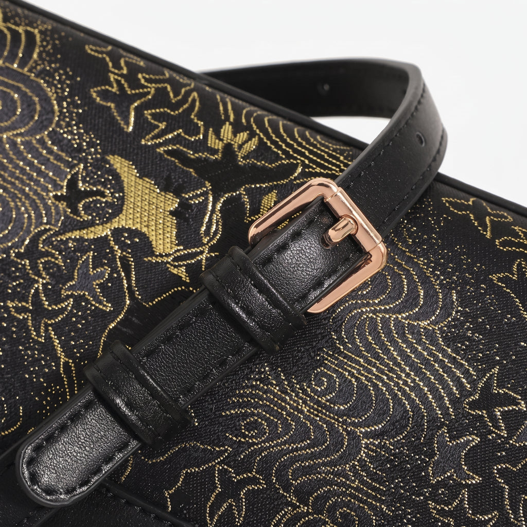 Bolso clutch de piel vegana con estampado de grullas