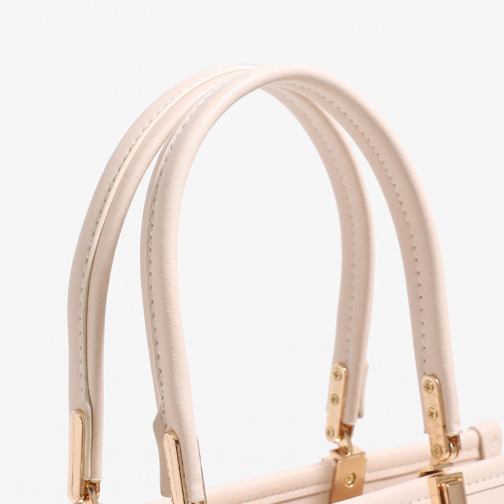 Bolso clutch geométrico de piel vegana