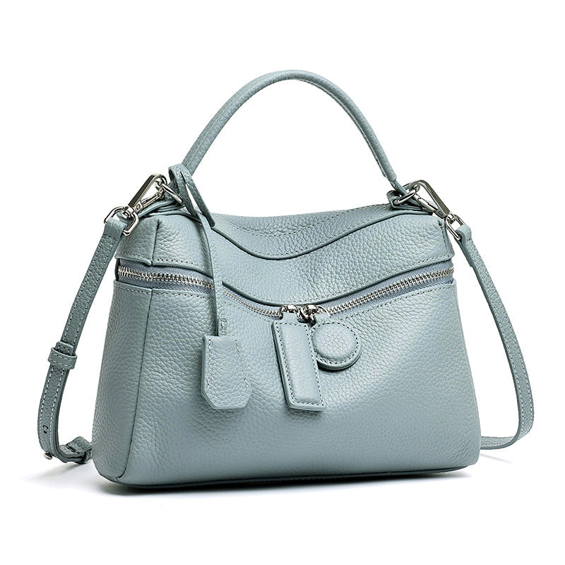 Bolso clutch cuadrado tipo almohada de piel
