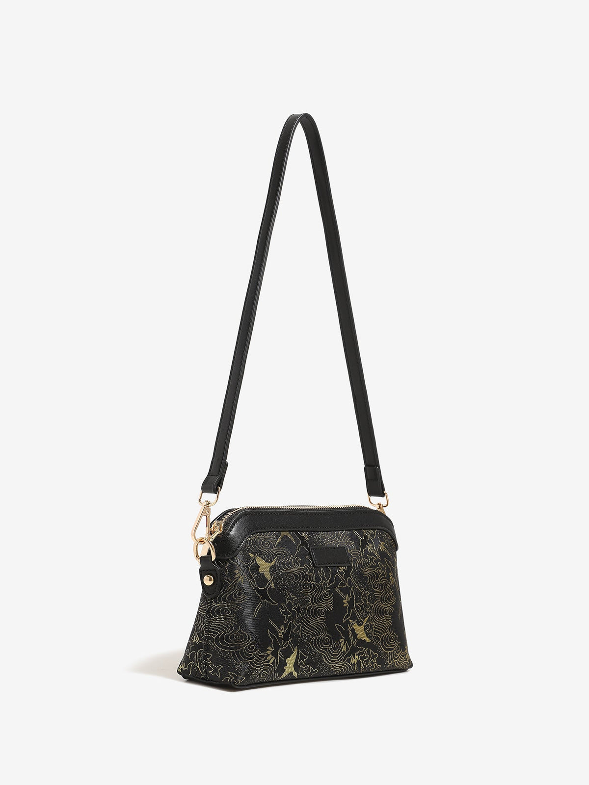 Bolso clutch de piel vegana con estampado de grullas