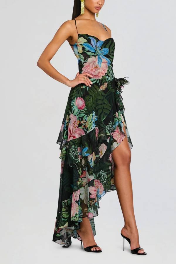 Vestido largo de flores con tirantes finos, espalda descubierta y volante asimétrico