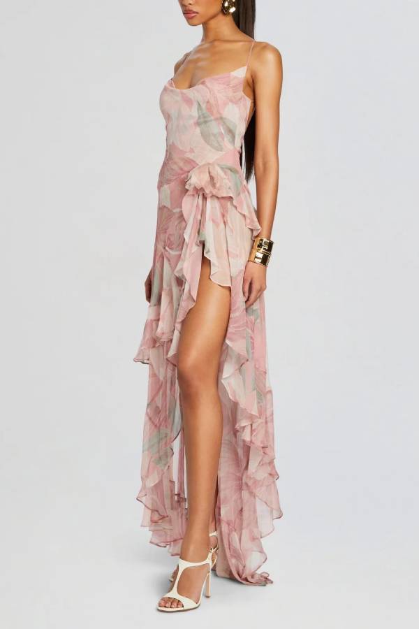 Vestido largo de flores con tirantes finos, espalda descubierta y volante asimétrico
