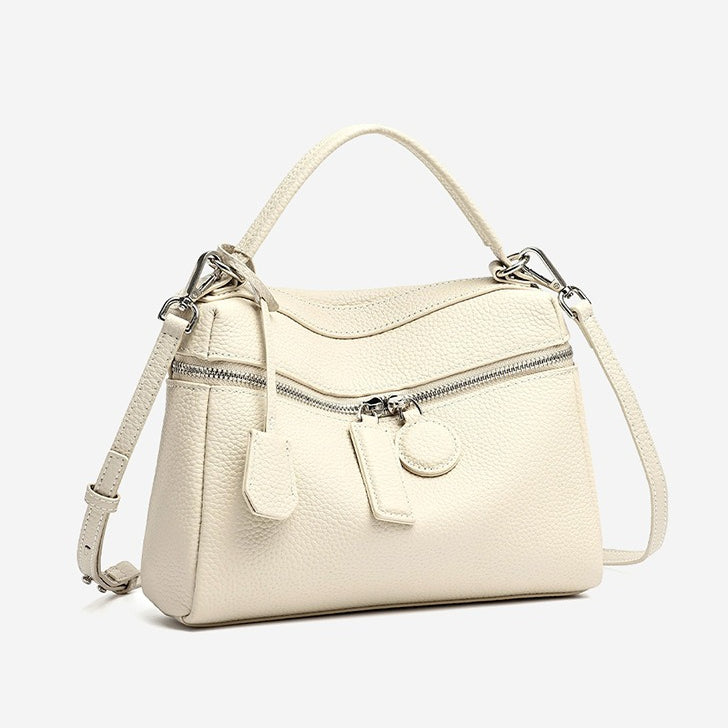 Bolso clutch cuadrado tipo almohada de piel