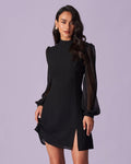 Vestido corto negro de transparencias con cuello alto y abertura