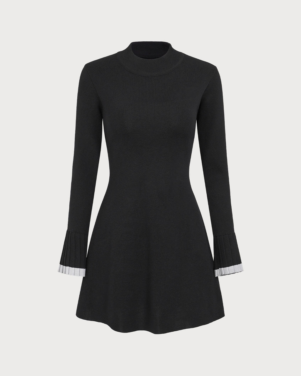 Vestido corto negro de punto con detalles en contraste